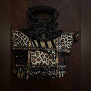 🐅🦓🐆…
✨vintage animal print mini purse✨